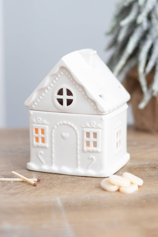 Witte oliebrander voor peperkoekhuis voor Kerstmis